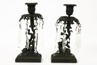 Lot 162 - A pair of late 19th bronze century candlesticks