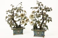 Lot 409 - A pair of Chinese hard stone ornaments in the form of trees