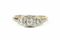 Lot 37 - An Art Deco single stone diamond ring with diamond set shoulders