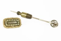 Lot 11 - An Art Deco diamond and seed pearl stick pin