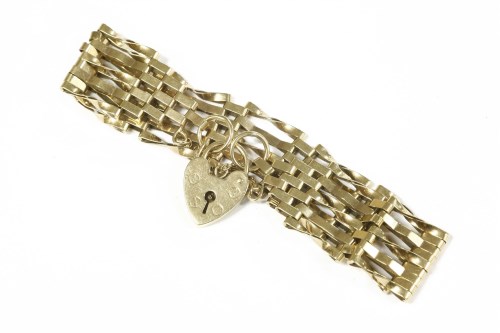 Lot 41 - A 9ct gold five row gate link bracelet with padlock