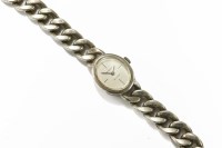 Lot 16 - A ladies Continental silver Dugena mechanical bracelet watch with curb link braclet