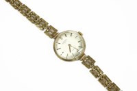 Lot 10 - A ladies gold Rotary mechanical bracelet watch