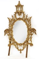 Lot 605 - A large 20th century Chippendale style gilt framed wall mirror