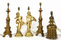 Lot 347 - A pair of gilt table lamps in the form of a putti