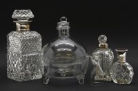 Lot 254 - A quantity of cut glass decanters and perfume bottles