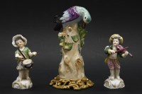 Lot 416 - A pair of small porcelain figures of musicians