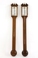 Lot 563 - A pair of Georgian style stick barometers