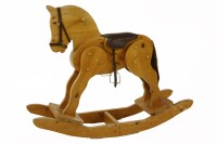 Lot 441 - A pine rocking horse