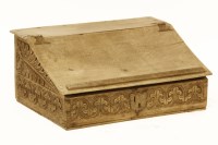 Lot 593 - An oak bible box. 64cm wide