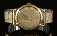 Lot 530 - A gentlemen's 9ct gold Omega automatic strap watch