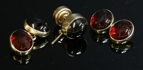Lot 45 - A pair of 9ct gold garnet cufflinks