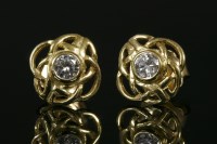 Lot 732 - A pair of single stone diamond stud earrings