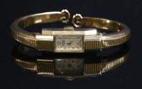 Lot 211 - A ladies' 9ct gold Rotary mechanical bangle watch