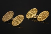Lot 665 - A pair of 18ct gold oval plaque chain link cufflinks