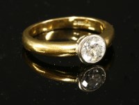Lot 435 - An 18ct two colour gold single stone diamond ring