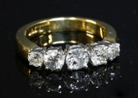 Lot 430 - An 18ct gold five stone diamond ring