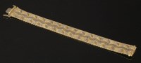 Lot 313 - An 18ct three colour gold brick link bracelet