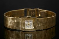 Lot 622 - A ladies' 9ct gold Swiss mechanical bracelet watch