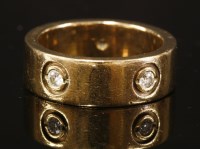 Lot 346 - A flat section gold band ring