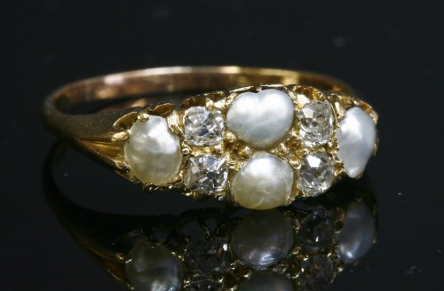 Lot 97 - A late Victorian split pearl and diamond boat-shaped ring