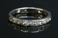 Lot 287 - A diamond set half eternity ring