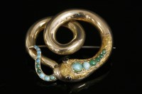 Lot 667 - A Victorian gold turquoise set snake brooch