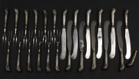 Lot 136 - Bill Brown cutlery collection: 11 pairs of Georgian silver handled knives and forks