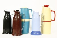 Lot 257 - A collection of Art Deco and later coloured bakelite flasks