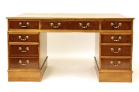 Lot 433 - A reproduction yew wood large twin pedestal desk