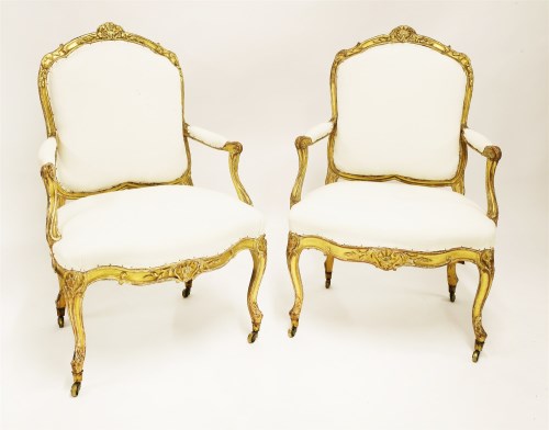 Lot 936 - A pair of Louis XV giltwood fauteuils