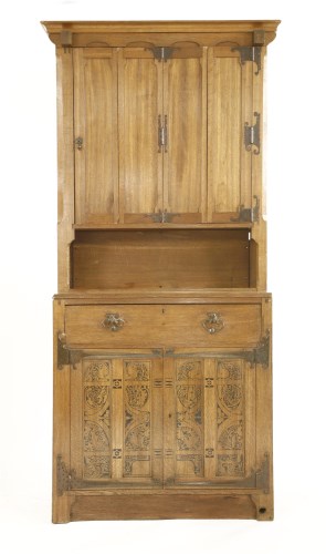 Lot 14 - A Continental Arts & Crafts oak bookcase