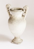 Lot 553 - A weathered marble oviform pedestal vase