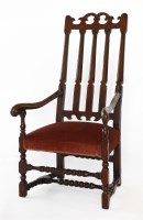 Lot 509 - A 17th century-style stained wood elbow chair
