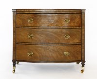 Lot 461 - A pair of mahogany three-drawer bow front chests