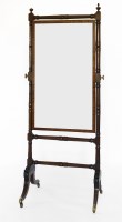 Lot 516 - A Regency mahogany and ebony strung cheval mirror