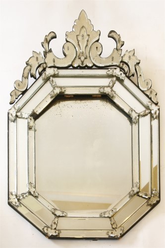 Lot 394 - A Venetian glass wall mirror