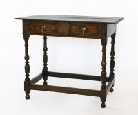 Lot 522 - An oak and fruitwood side table