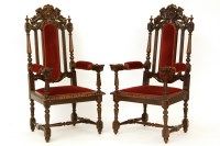 Lot 452 - A pair of late 19th century carved oak throne chairs