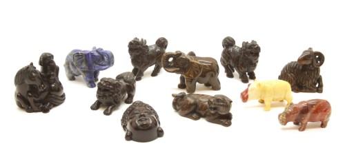 Lot 86 - Six Japanese carved wooden animal netsukes and a mask
