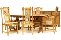 Lot 455 - An Ercol dining suite