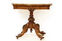 Lot 445 - A Victorian fold-over card table