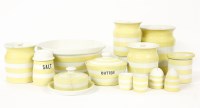 Lot 390A - A set of yellow and white Cornish ware