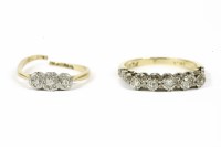 Lot 24 - A gold five stone diamond ring