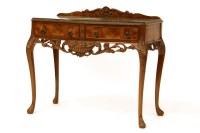 Lot 468 - A Georgian style walnut two drawer side table