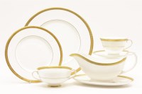 Lot 392 - A Royal Doulton Royal Gold porcelain dinner service