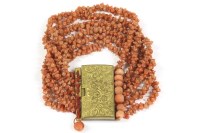 Lot 44 - A Regency six strand coral bead bracelet