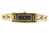 Lot 26 - A ladies gold plated Gucci quartz bracelet watch