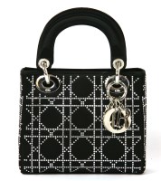 Lot 1003 - A Christian Dior 'Lady Dior' black satin evening handbag