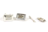 Lot 33 - A pair of single stone baguette cut diamond stud earrings